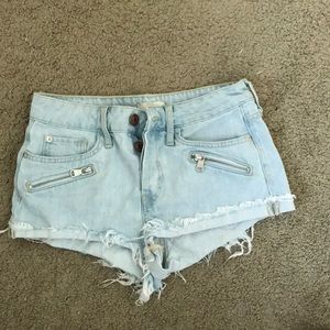 Light wash distressed jean shorts